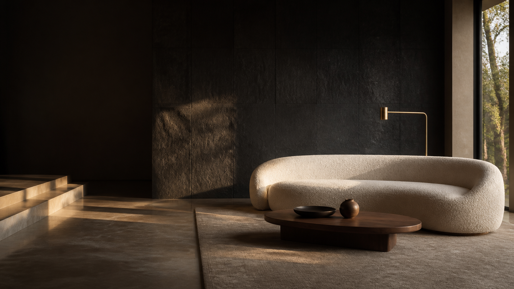Curved ivory sofa in a warm architectural living space
